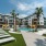 Roadrunner on McDowell's resort-style swimming pool surrounded by lounge seating and cabanas