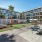Entertainment courtyard featuring hammocks, fire pit, cornhole and Airstream at Roadrunner on McDowell